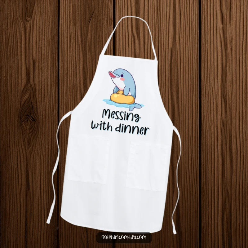 Funny Apron: A mischievous dolphin playfully nudging a floating object. Humorous and practical kitchen wear for playful chefs.