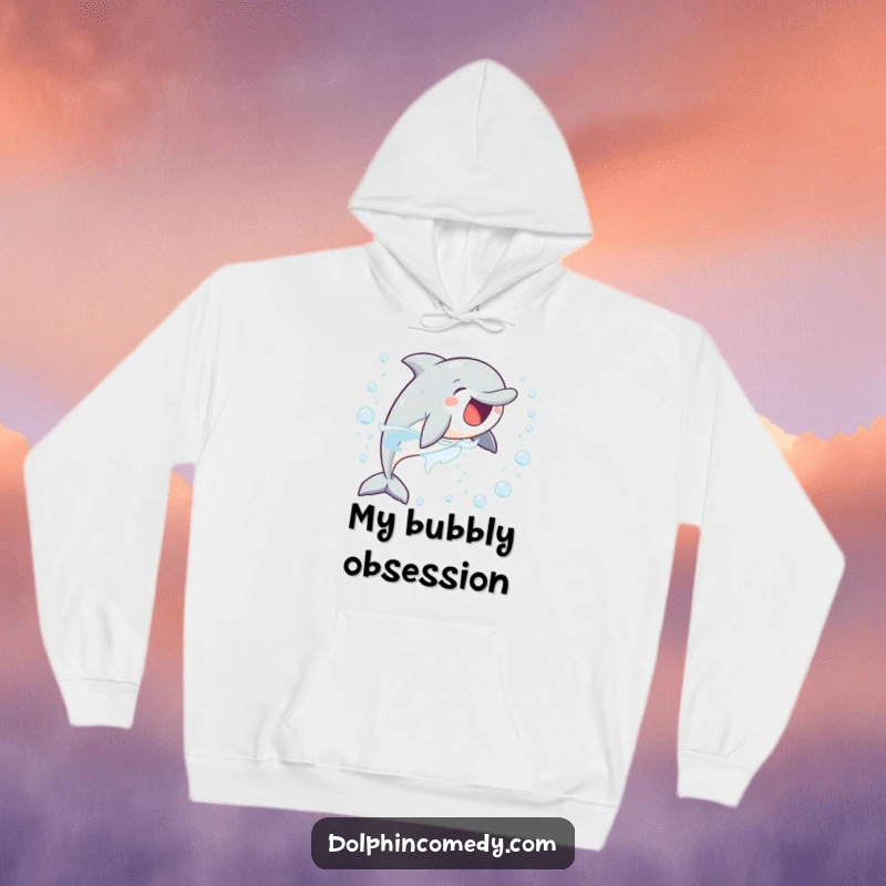 Funny, cozy hoodie showing a delighted dolphin enthusiastically chasing a stream of bubbles, offering warmth and playful vibes.