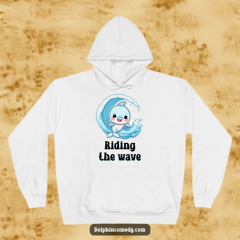 Funny Dolphin Hoodie depicting a cheerful dolphin joyfully playing and riding a playful wave, embodying aquatic fun.