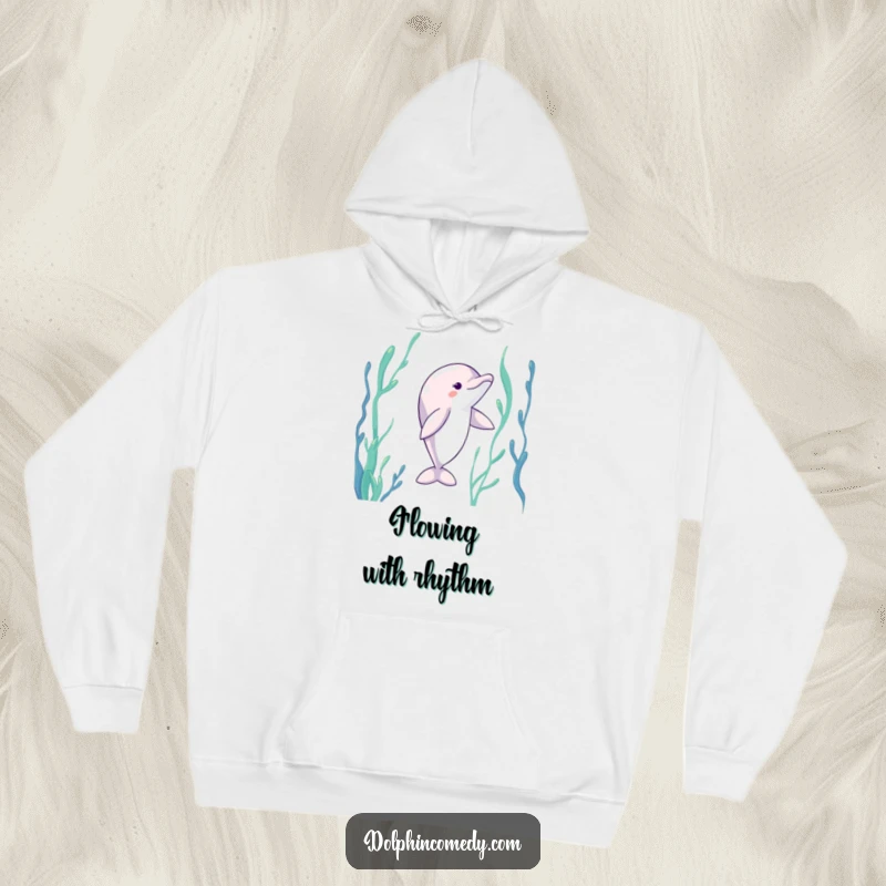 Funny Dolphin Hoodie: A cozy hoodie depicting a dolphin gracefully dancing through underwater kelp, blending comfort with aquatic artistry.