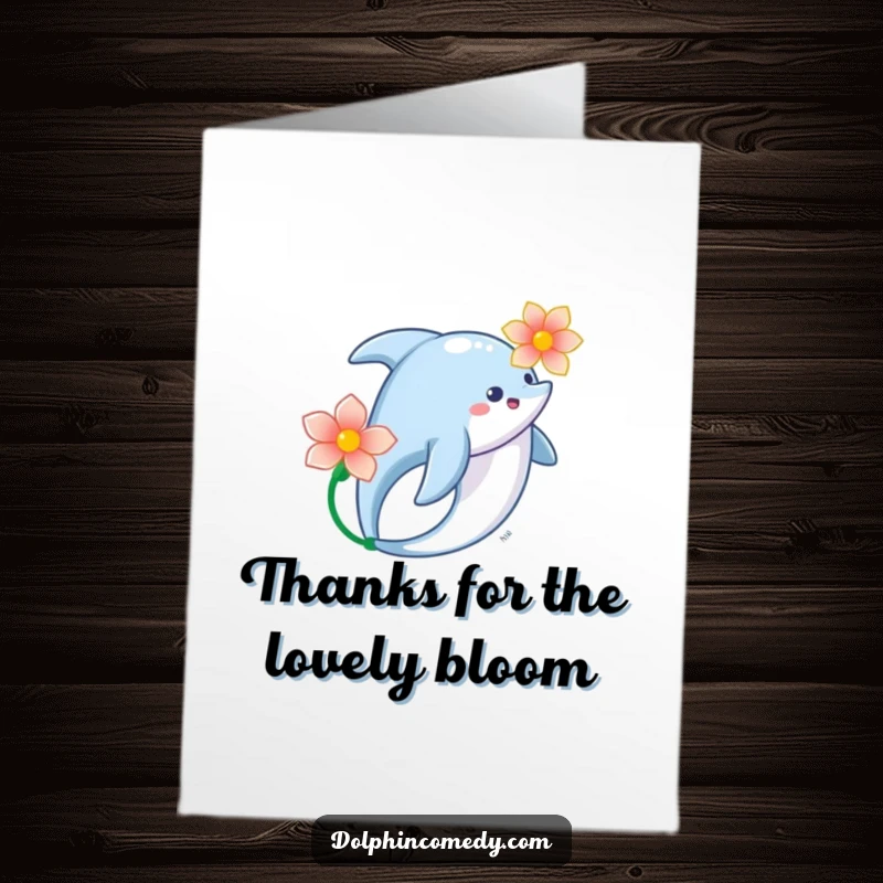 Funny Free Printable Thank You Card: A dolphin gracefully carries a flower, conveying gentle and sincere thanks, downloadable.