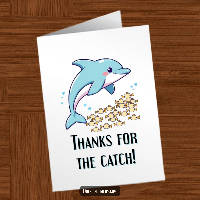 Free Printable Thank You Card: Dolphin playfully pursues a school of fish, humorously conveying thanks.