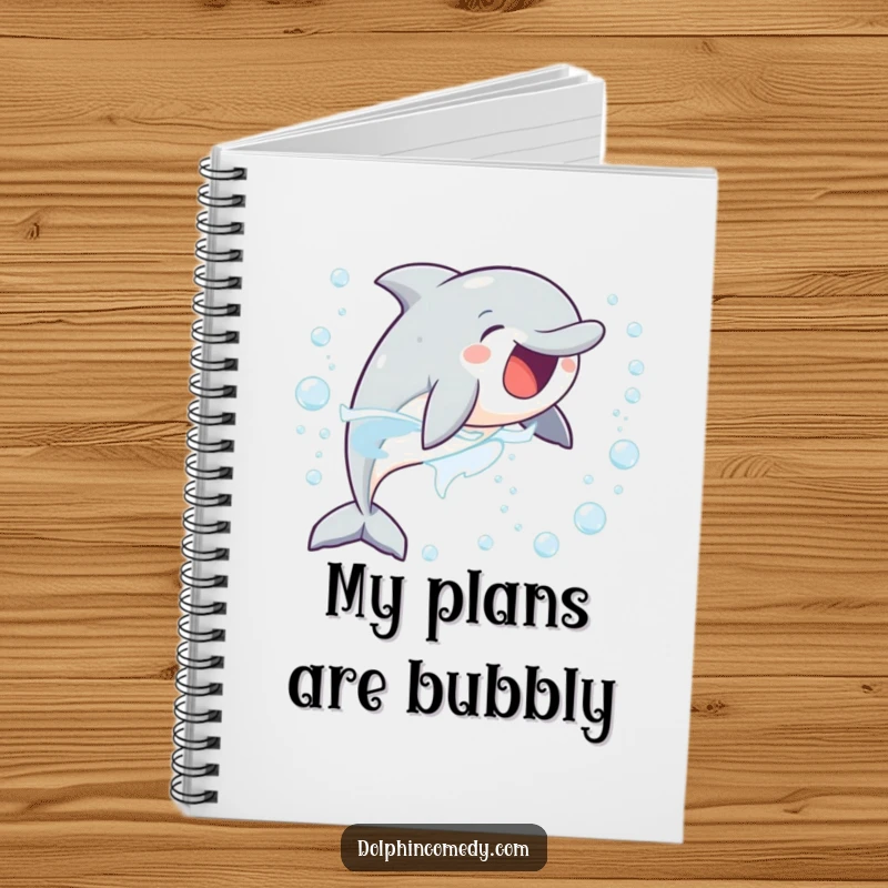 Funny notebook cover showing a delighted dolphin joyfully chasing bubbles, perfect for jotting down excited ideas.