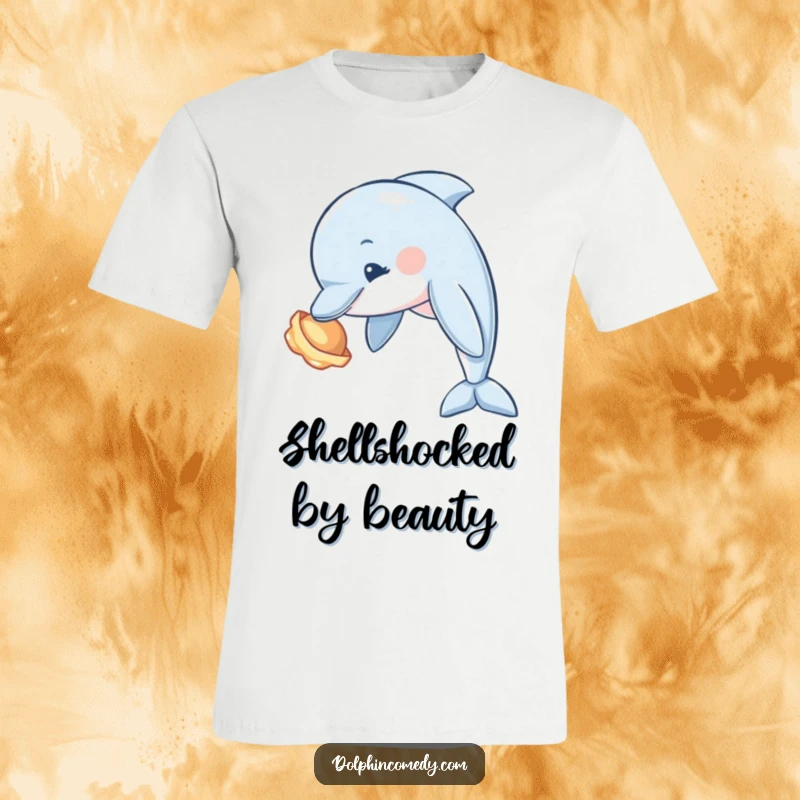 Funny Dolphin T-Shirt with a curious dolphin tilting its head to examine a shiny seashell, perfect for ocean lovers.