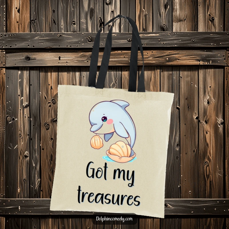 Funny canvas tote bag featuring a curious dolphin nudging a seashell, ideal for carrying essentials with a touch of charm.