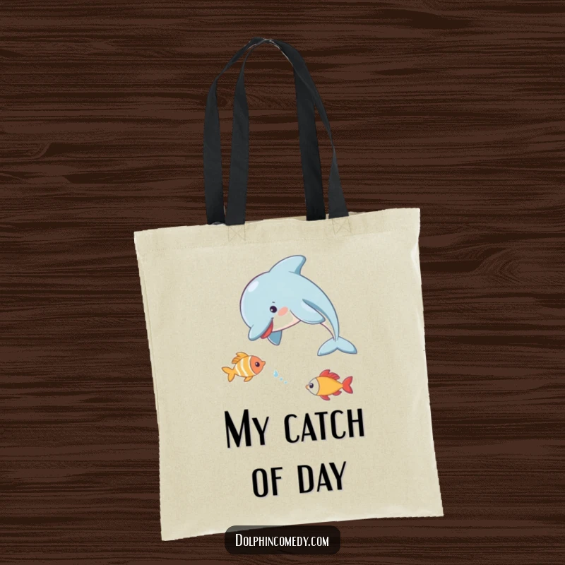 Funny Dolphin Tote Bag showcasing a dolphin playfully chasing a small fish, a humorous and functional accessory.