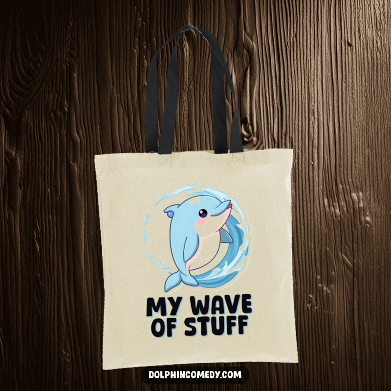 Funny Dolphin Tote Bag showing a playful dolphin twirling in a wave with sparkling eyes, great for beach trips.