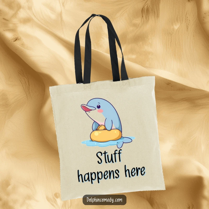Funny Tote Bag: A mischievous dolphin playfully nudging an object. Humorous and practical accessory for everyday use.